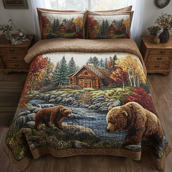 Autumn Cabin Glow quilted 3-piece bedding set on a made bed with two matching pillow shams