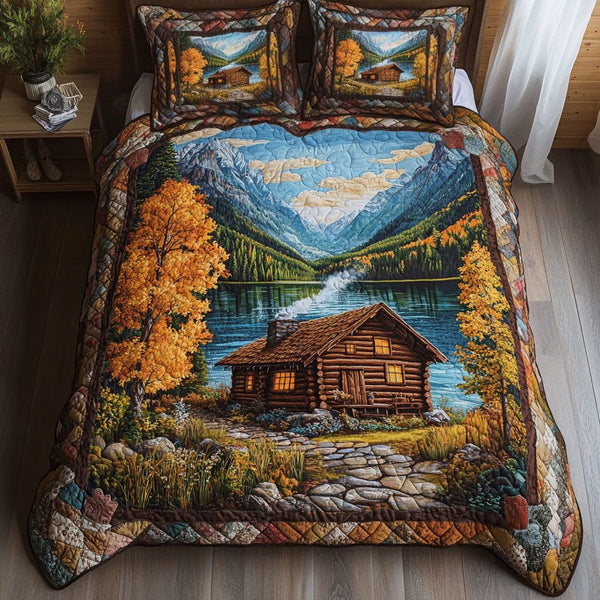 Autumn Cabin Lake quilted 3-piece bedding set on a made bed with two matching pillow shams