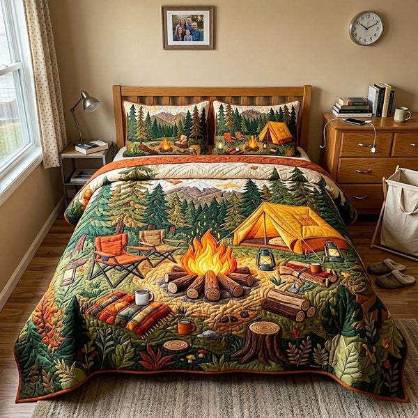Autumn Campfire quilted 3-piece bedding set on a made bed with two matching pillow shams