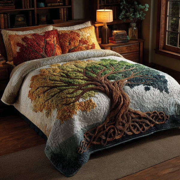 Autumn Canopy quilted 3-piece bedding set on a made bed with two matching pillow shams
