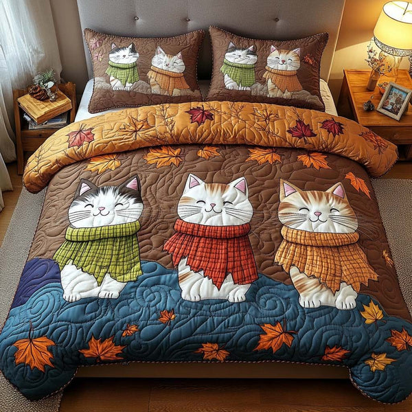 Autumn Cozy Cat quilted 3-piece bedding set on a made bed with two matching pillow shams