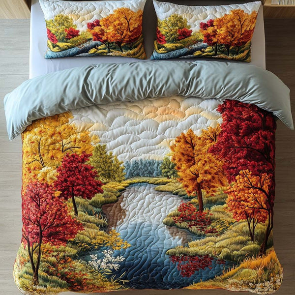 Autumn Echoes quilted 3-piece bedding set on a made bed with two matching pillow shams