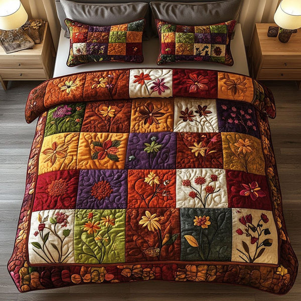 Autumn Floral quilted 3-piece bedding set on a made bed with two matching pillow shams