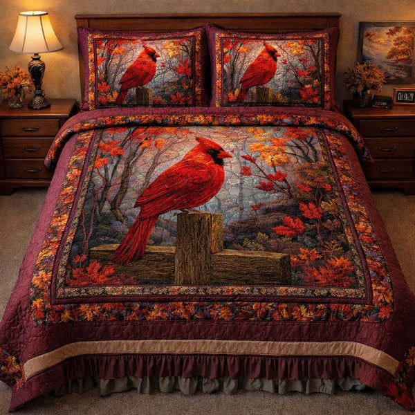 Autumn Forest Cardinal quilted 3-piece bedding set on a made bed with two matching pillow shams