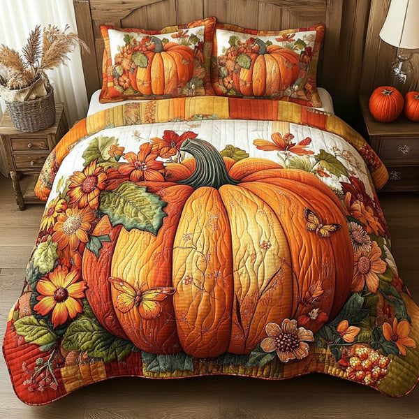 Autumn Glow quilted 3-piece bedding set on a made bed with two matching pillow shams