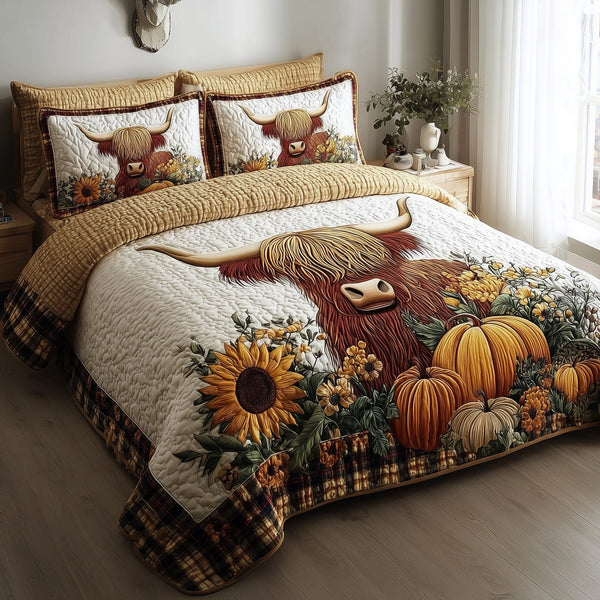 Autumn Highland Cow quilted 3-piece bedding set on a made bed with two matching pillow shams