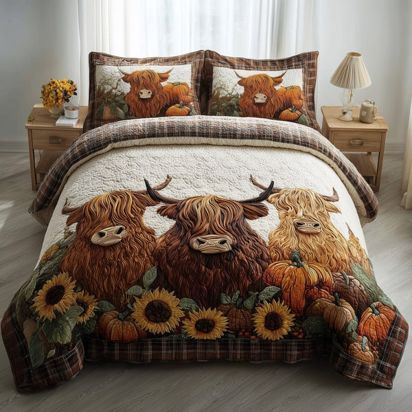 Autumn Highland Cow quilted 3-piece bedding set on a made bed with two matching pillow shams