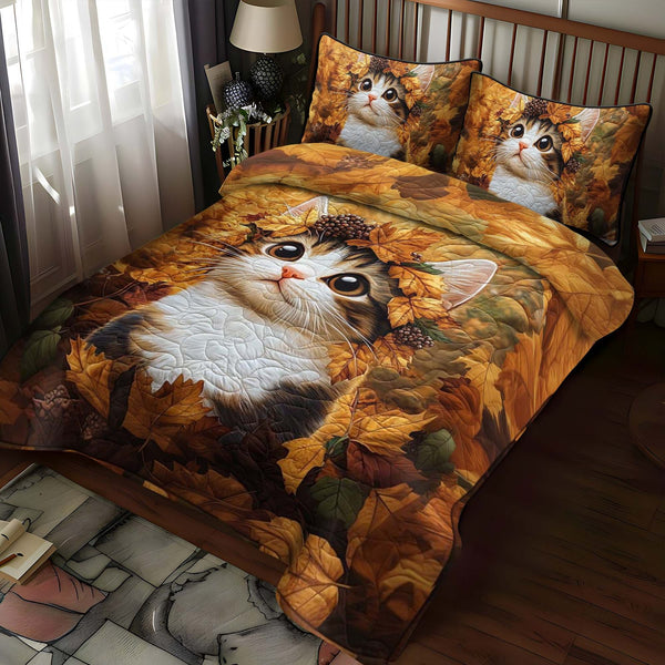 Autumn Kitten quilted 3-piece bedding set on a made bed with two matching pillow shams