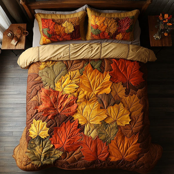 Autumn Leaves quilted 3-piece bedding set on a made bed with two matching pillow shams