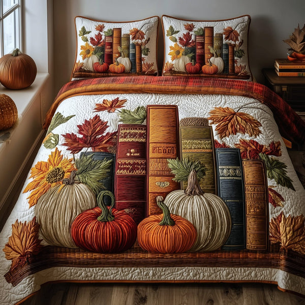 Autumn Library quilted 3-piece bedding set on a made bed with two matching pillow shams