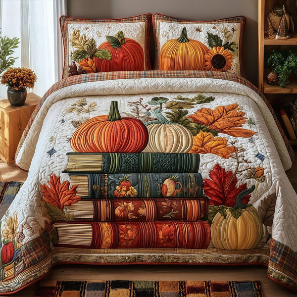 Autumn Library quilted 3-piece bedding set on a made bed with two matching pillow shams