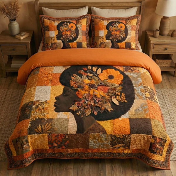 Autumn Muse quilted 3-piece bedding set on a made bed with two matching pillow shams