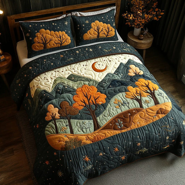 Autumn Night quilted 3-piece bedding set on a made bed with two matching pillow shams
