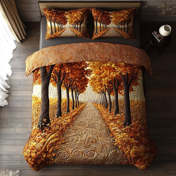 Autumn Pathways quilted 3-piece bedding set on a made bed with two matching pillow shams