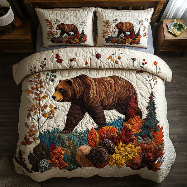 Autumn Paws quilted 3-piece bedding set on a made bed with two matching pillow shams