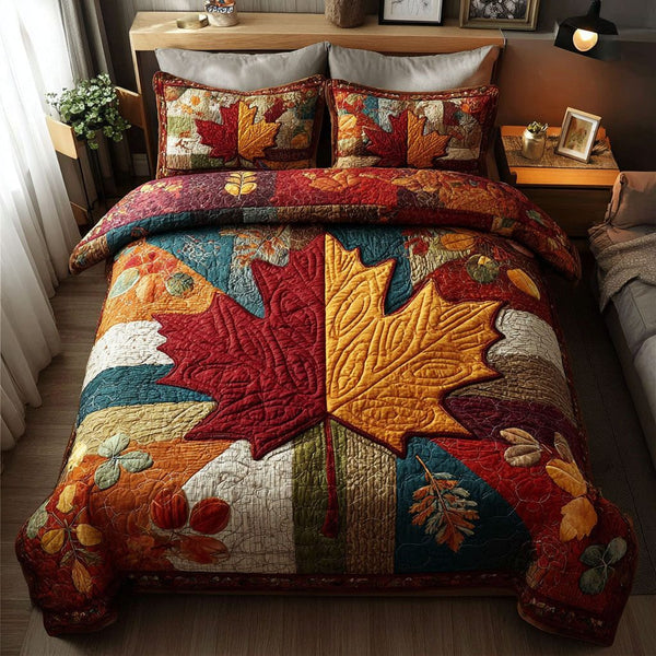 Autumn Petals quilted 3-piece bedding set on a made bed with two matching pillow shams