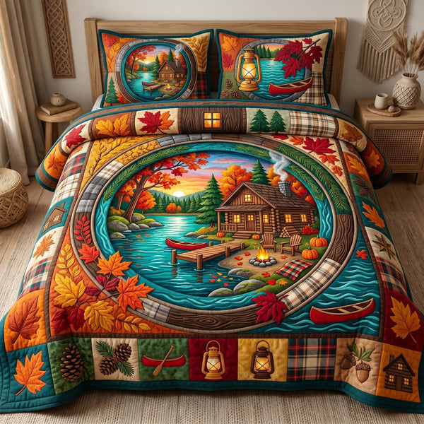 Autumn Retreat quilted 3-piece bedding set on a made bed with two matching pillow shams