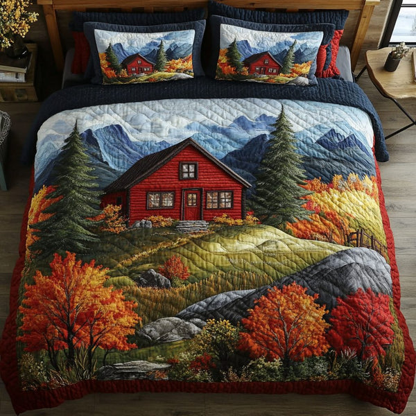 Autumn Retreat quilted 3-piece bedding set on a made bed with two matching pillow shams
