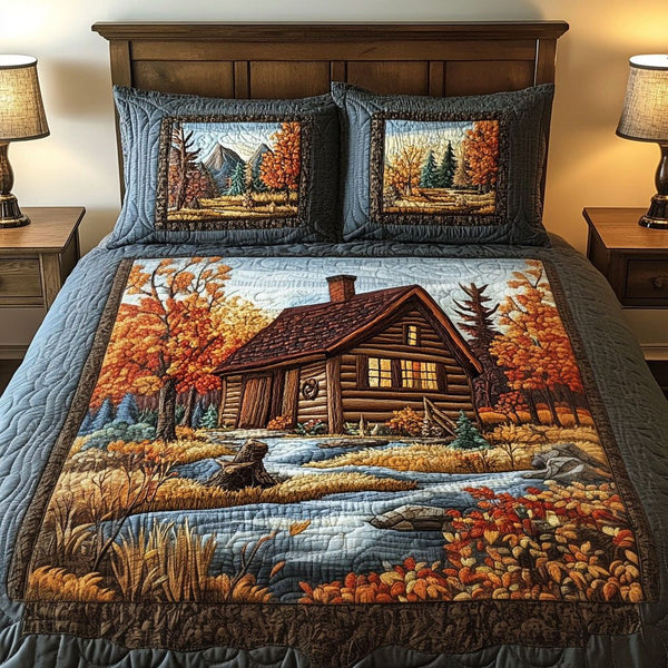 Autumn Retreat quilted 3-piece bedding set on a made bed with two matching pillow shams