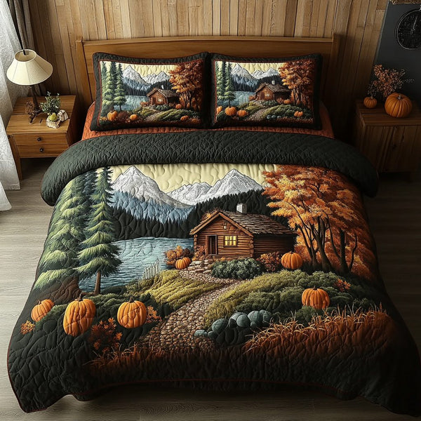 Autumn Retreat quilted 3-piece bedding set on a made bed with two matching pillow shams