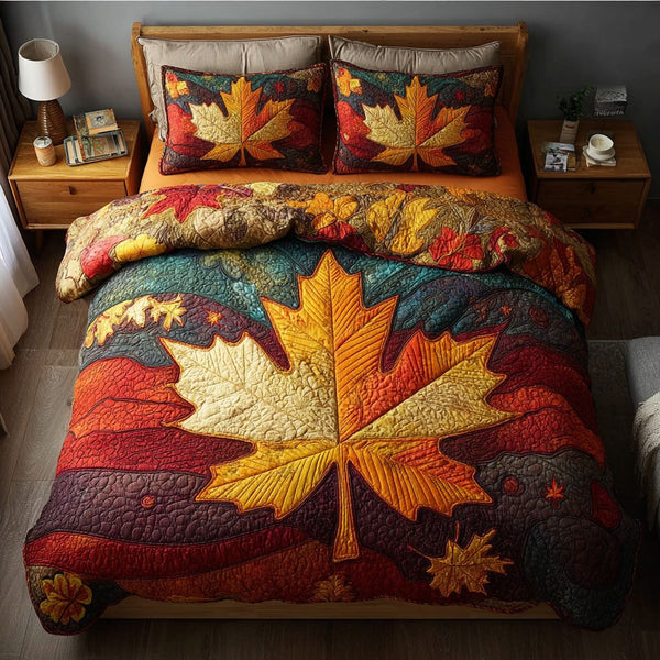 Autumn Stroll quilted 3-piece bedding set on a made bed with two matching pillow shams