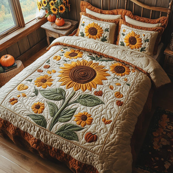 Autumn Sunrise quilted 3-piece bedding set on a made bed with two matching pillow shams