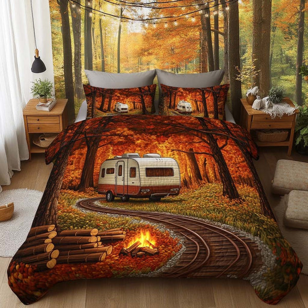 Autumn Trail Camper quilted 3-piece bedding set on a made bed with two matching pillow shams
