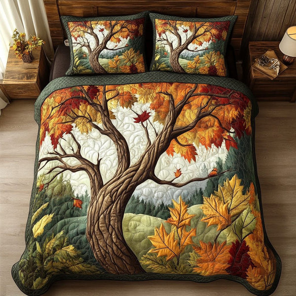 Autumn Tree quilted 3-piece bedding set on a made bed with two matching pillow shams