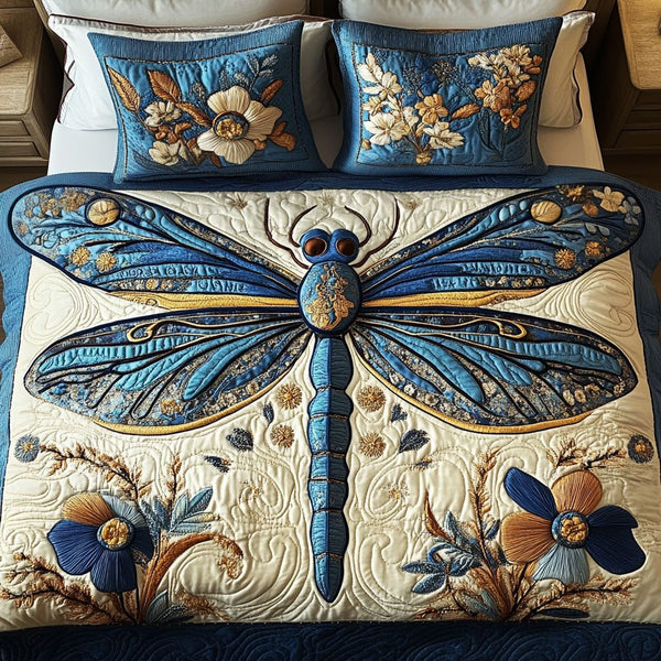 Azure Majesty quilted 3-piece bedding set on a made bed with two matching pillow shams