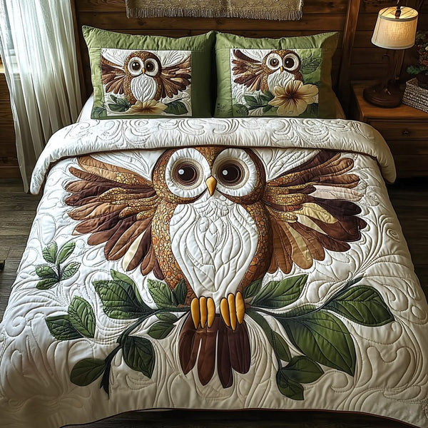 Baby Owl Charm quilted 3-piece bedding set on a made bed with two matching pillow shams