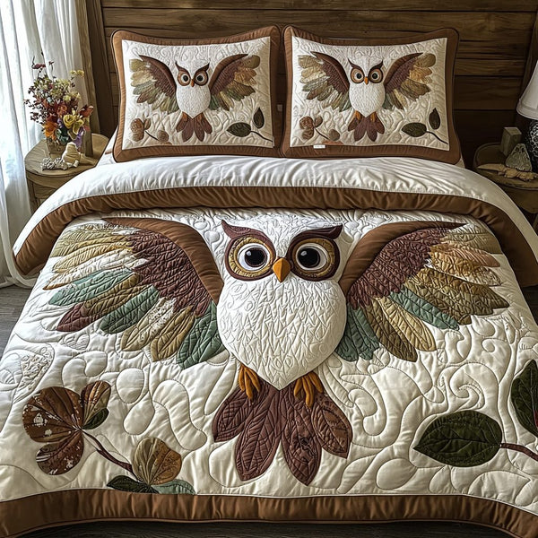 Baby Owl quilted 3-piece bedding set on a made bed with two matching pillow shams