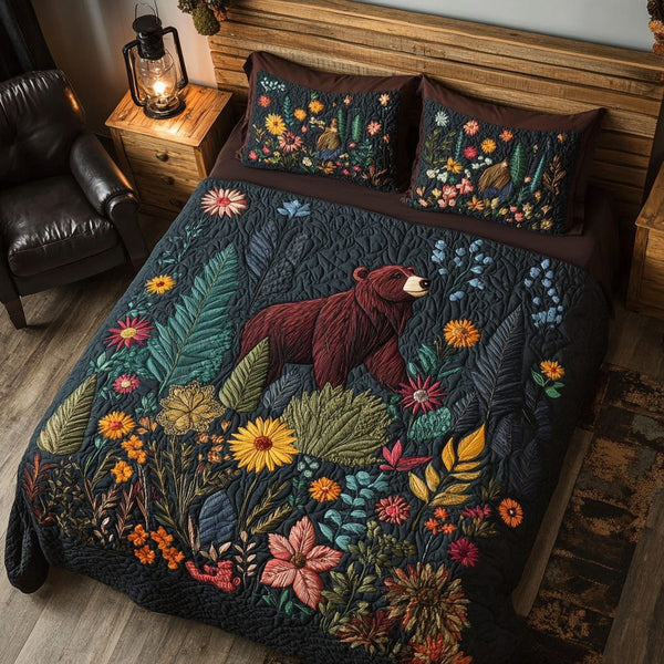 Backwoods Comfort quilted 3-piece bedding set on a made bed with two matching pillow shams