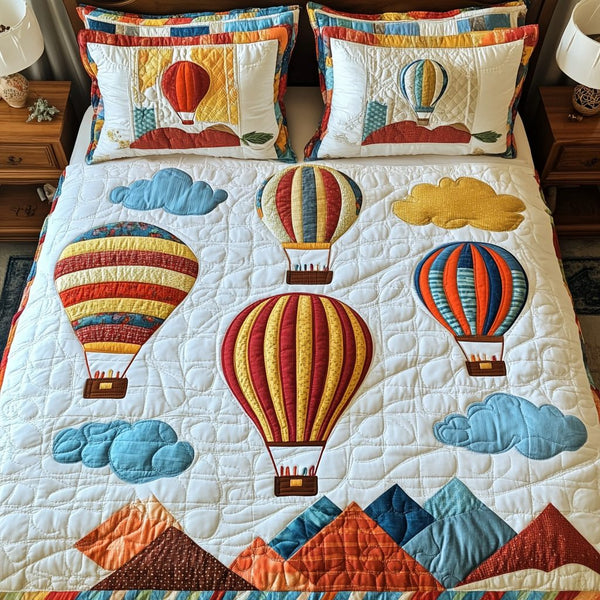 Balloon Breeze quilted 3-piece bedding set on a made bed with two matching pillow shams