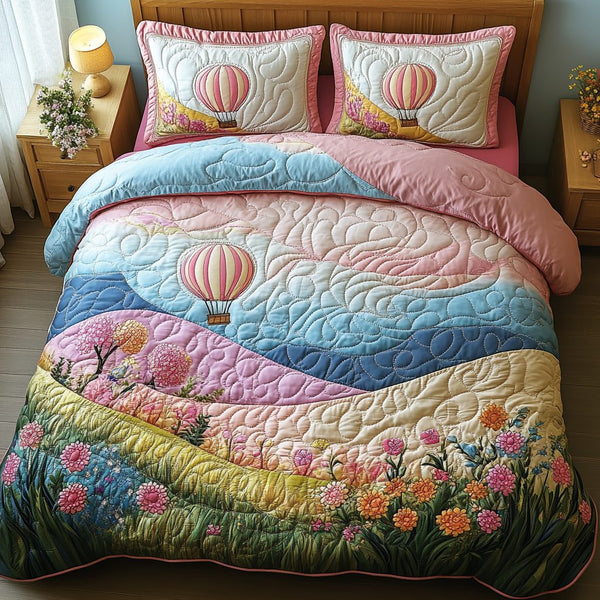 Balloon Odyssey quilted 3-piece bedding set on a made bed with two matching pillow shams