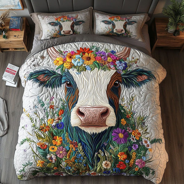 Barnyard Bloomers quilted 3-piece bedding set on a made bed with two matching pillow shams