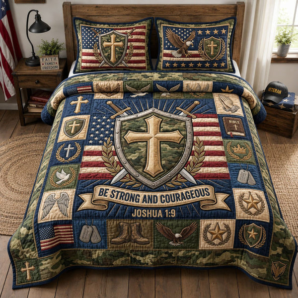 Be Strong And Courageous quilted 3-piece bedding set on a made bed with two matching pillow shams