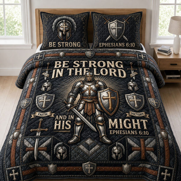 Be Strong In The Lord quilted 3-piece bedding set on a made bed in a softly lit bedroom