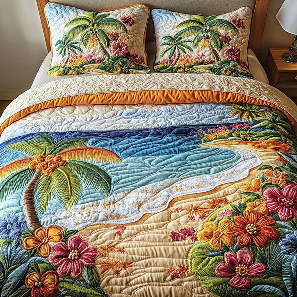 Beach Bungalow quilted 3-piece bedding set on a made bed in a light coastal bedroom