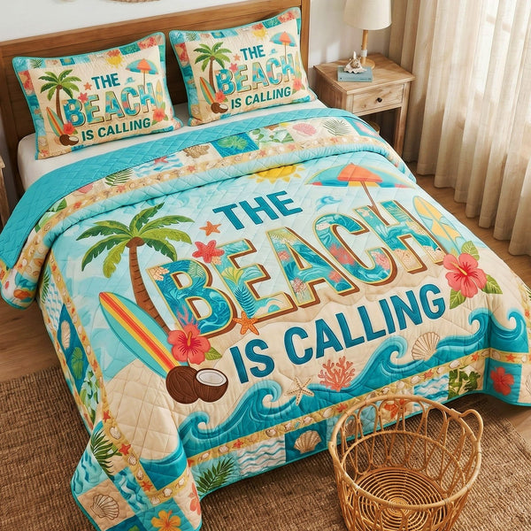Beach Calling quilted 3-piece bedding set on a made bed in a light coastal bedroom