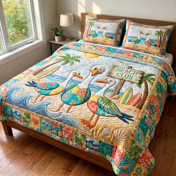 Beach Club quilted 3-piece bedding set on a made bed in a light coastal bedroom