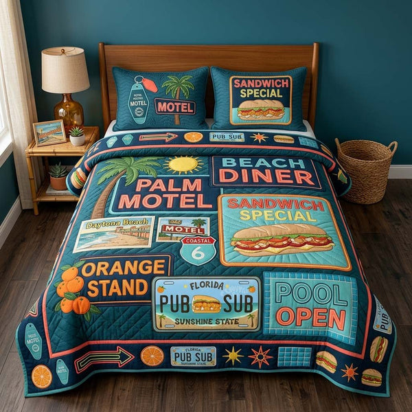Beach Diner quilted 3-piece bedding set on a made bed in a light coastal bedroom
