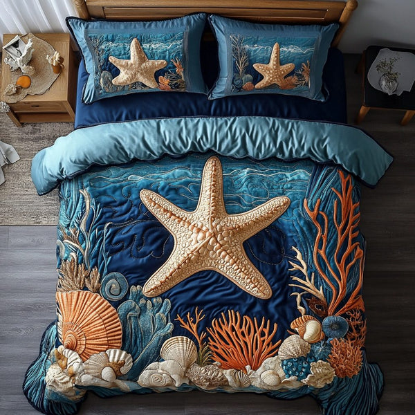 Beach Escape quilted 3-piece bedding set on a made bed in a light coastal bedroom