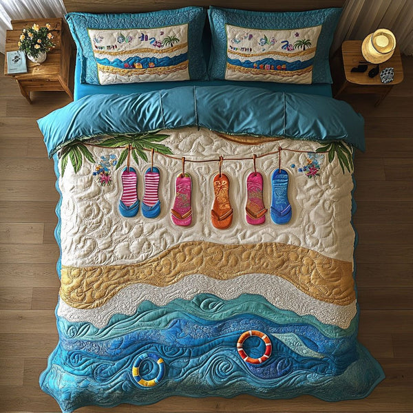 Beach Getaway quilted 3-piece bedding set on a made bed in a light coastal bedroom