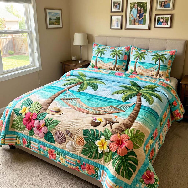 Beach Hammock quilted 3-piece bedding set on a made bed in a light coastal bedroom