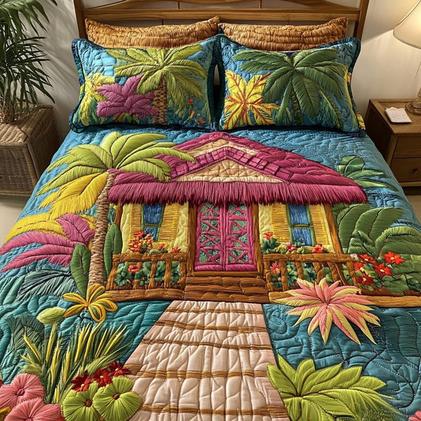 Beach House quilted 3-piece bedding set on a made bed in a light coastal bedroom