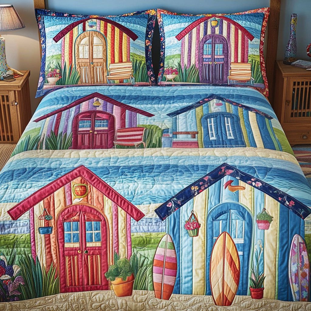 Beach Hut Bliss quilted 3-piece bedding set on a made bed in a light coastal bedroom