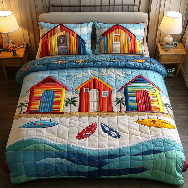 Beach Hut Shores quilted 3-piece bedding set on a made bed in a light coastal bedroom