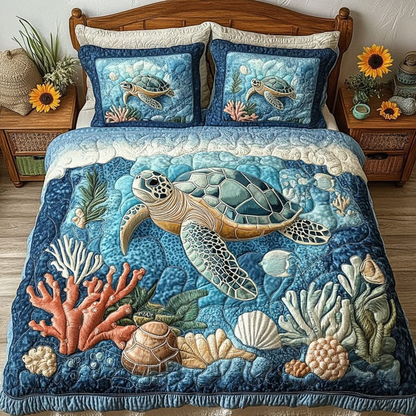 Beach Vibes quilted 3-piece bedding set on a made bed in a light coastal bedroom