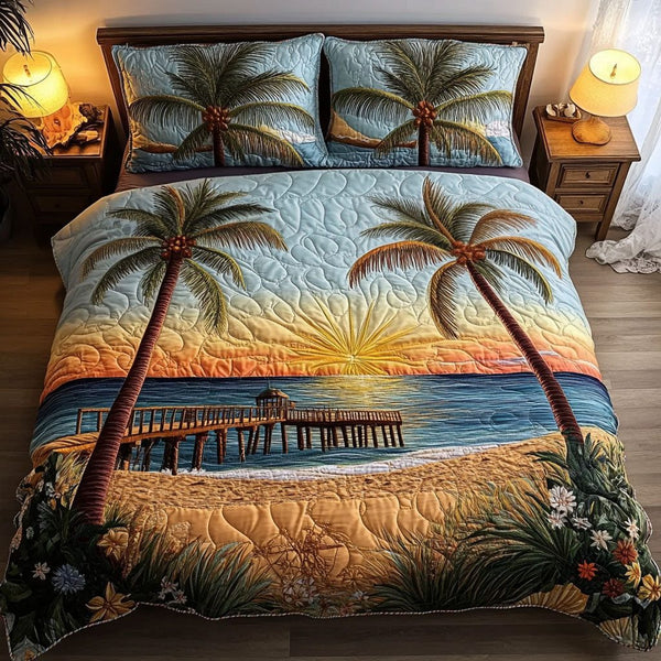 Beachfront Bliss quilted 3-piece bedding set on a made bed in a light coastal bedroom