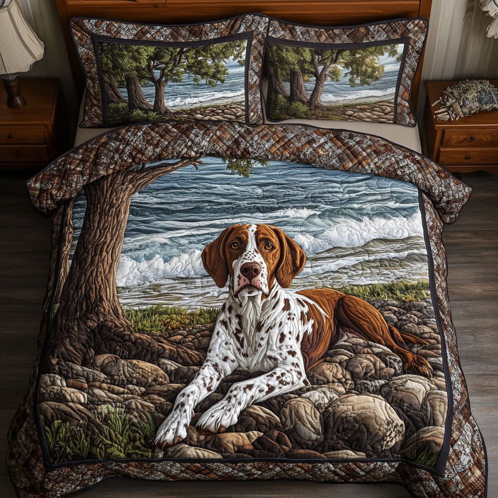 Beachside Pointer quilted 3-piece bedding set on a made bed in a light coastal bedroom